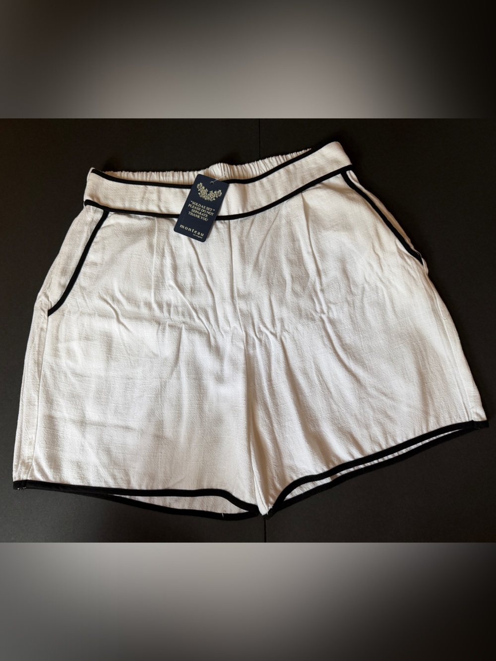 White Shorts with Black Trim